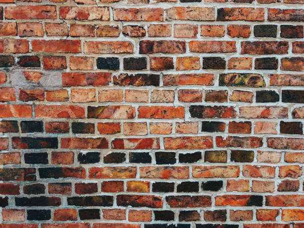istock Vitrified rustic brick wall tile pattern as background. Scandinavian architecture style detail from Halmstad in Sweden. 1447893538