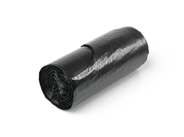 istock Garbage Bag Roll Isolated. Trash Package, New Rolled Plastic Bin Bags, Black Polyethylene Waste Container 1447898916