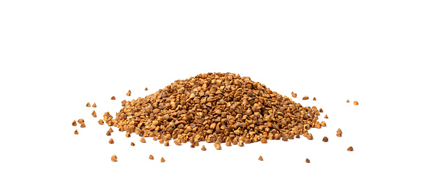 Raw Buckwheat Pile Isolated, Dry Buck Wheat Grains, Russian Kasha Heap, Uncooked Buckwheat Cut Out on White Background Side View