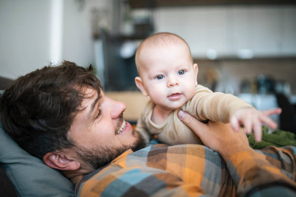 istock Father enjoying time with his baby boy at home. 1447902864
