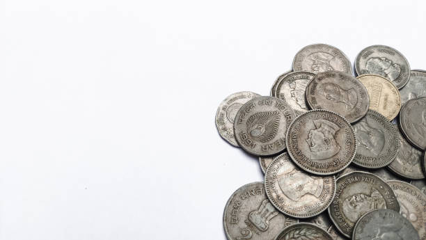 istock Old coins isolated on white background 1447905229