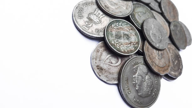 istock Old coins isolated on white background 1447905301