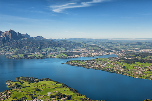 Thun, Switzerland, February 13, 2023 Water promenade at the lake of Thun on a sunny day