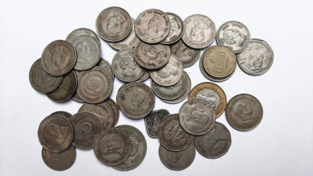 istock Old coins on white background, rare coins 1447905588