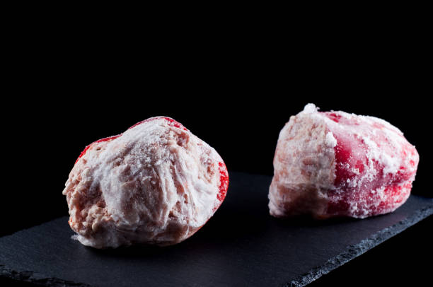 istock frozen stuffed peppers on a stone plate on a black background, isolate 1447908176