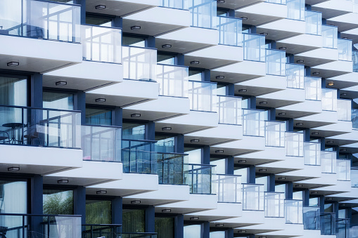 Rows of balconies in modern apartment building