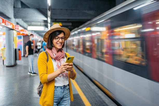 istock Young Woman Using Phone In A Subway Station 1447910152