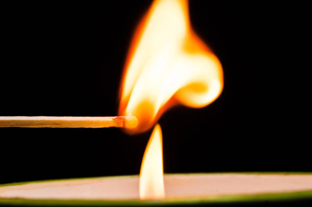 Light at incense from candle.