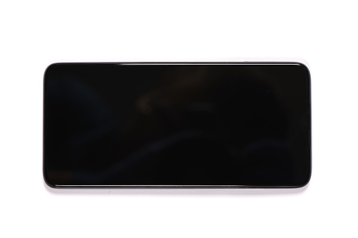 Black mobile smartphone with blank screen. isolated on white background. High resolution photo. Full depth of field.