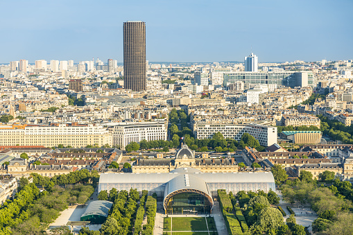 Champs de Mars park, Grand Palais Ephemere and Montparnasse tower in Paris, France