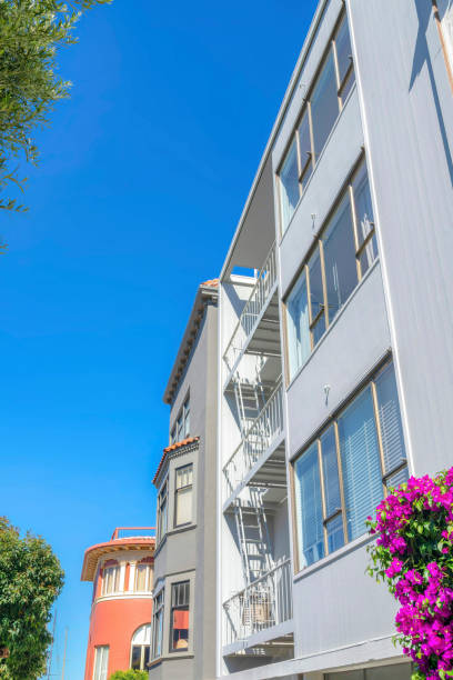 istock Modern low-rise apartment buildings in a low angle view at San Francisco, CA 1447920877