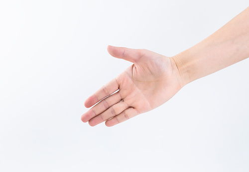 A hand displaying three fingers, specifically the index, middle, and ring fingers, against a clean white background.