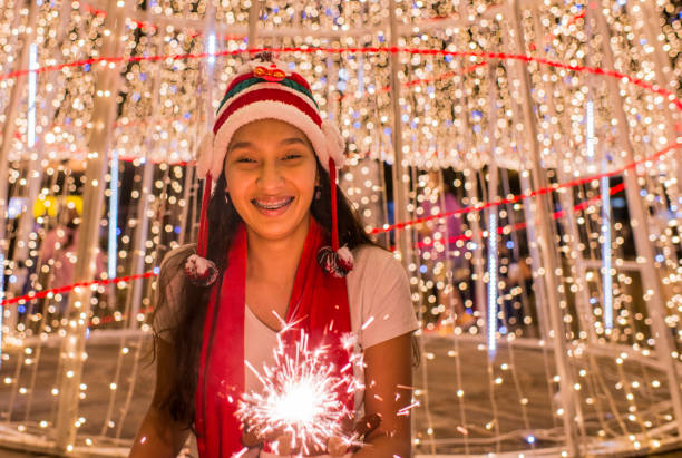 istock woman in christmas festivities 1447923943