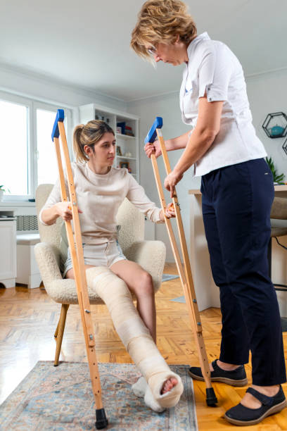 istock Physical therapist in home visit 1447925323