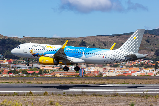 Tenerife, Spain - September 22, 2022: Vueling Airbus A320 airplane with 25 years Disneyland Paris special livery at Tenerife Norte airport (TFN) in Spain.