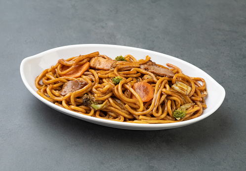Yakisoba, traditional asian pasta with noodles, meat and vegetables.