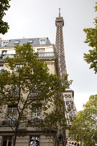 The Eiffel tower seen from the avenue de la Bourdonnais in Paris France