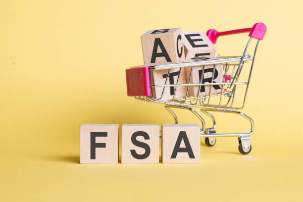 fsa - flexible spending account - letter pices on the wooden cubes, yellow background. fsa - flexible spending account - letter pices on the wooden cubes, yellow background. free syrian army stock pictures, royalty-free photos & images