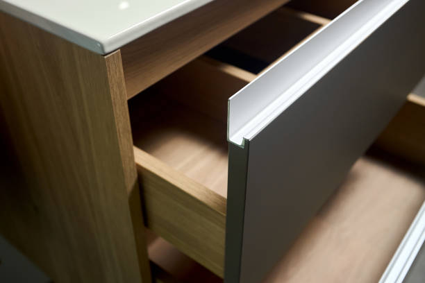 istock Sliding lockers with aluminum extruded G profile handles for bathroom kitchen cabinets. Solutions for placing things in bathroom horizontal sliding pull out drawer shelves storage of cupboard. 1447944593