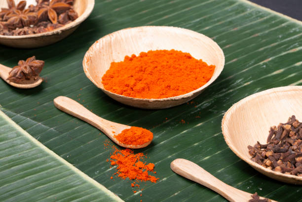 istock Chilli pepper and assorted spices on banana leaf. 1447947125