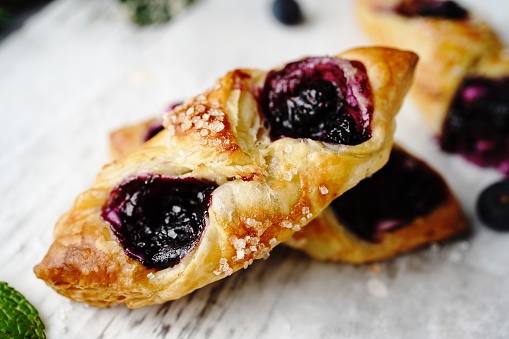 Homemade Blueberry Danish with Puff pastry o holiday background