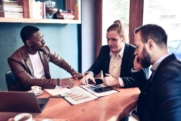 istock Three Businessmen Of Different Ethnicities Making Necessary Corrections To Improve Company Revenue 1447948951