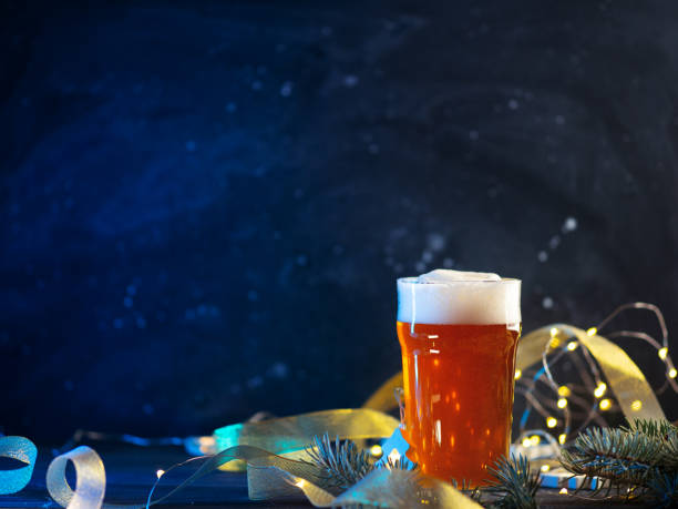 istock glass of light beer on a Christmas background copy space 1447952094