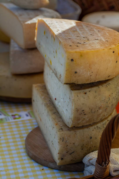 istock Craft cheese from cows milk. Cheese head. Selective focus 1447952467