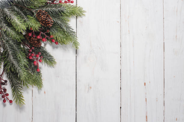 istock Christmas decorations on white wood background. Space for text. Top view. 1447959513