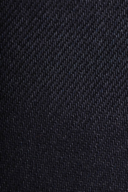 istock Close up shot of a blue colored jeans texture background. 1447960133