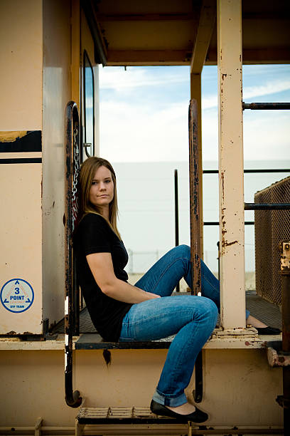 young woman on a train stock photo