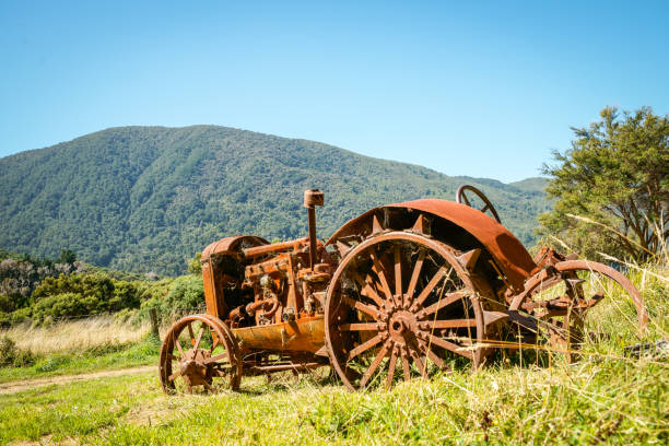 istock Vintage agricultural tractor deserted and rusting away 1447965126