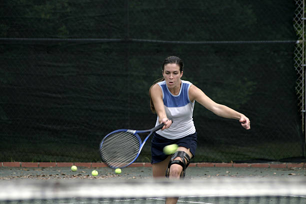 istock attractive tennis player in action 144796619