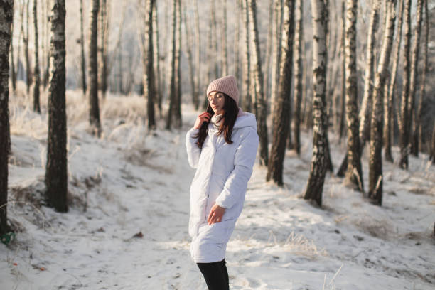 istock Brunette woman in white jacket 1447966367