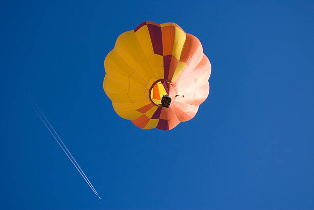istock Yellow Hot Air Balloon and Airplane 144796678