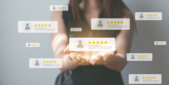 Business people using smartphone and pressing review popup on visual screen, customer review by five star feedback, positive customer feedback testimonial.