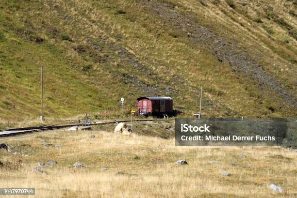 Aerial Scenic Landscape In The Swiss Alps With Railway Track At Region Of Swiss Mountain Pass Furkapass On A Sunny Late Summer Morning Stock Photo - Download Image Now