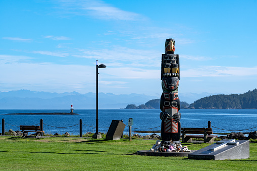 Port Hardy, BC Canada - September 24, 2021: Totem Pole at Carrot Park, Port Hardy, Vancouver Island, BC Canada