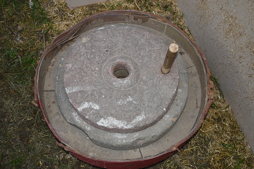 A grinding stone inside an olive oil factory in Mendoza, Argentina