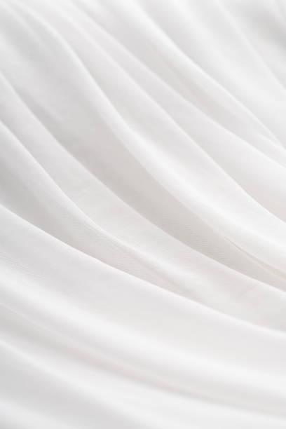 istock WHITE BACKGROUND OF SILK CLOTH 1447977287