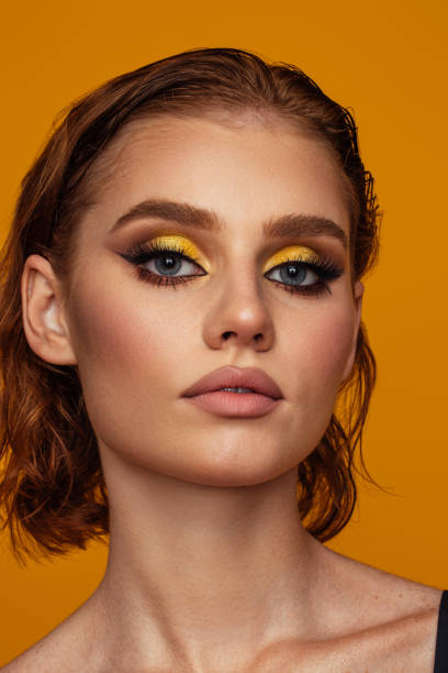 istock Beautiful woman with bright make-up 1447978518