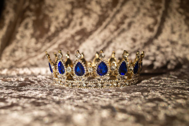 istock Royal  golden crown with blue stones 1447979475