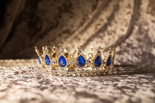 istock Royal  golden crown with blue stones 1447979481
