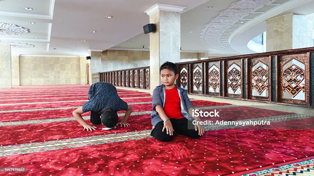 Muslim boys salat in the mosque 10-11 Years Stock Photo