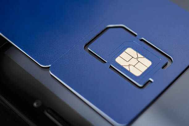 Full-size blue SIM card with pre-cut mini, micro, nano sizes. Macro shot