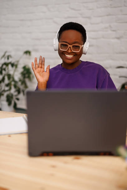 istock A young business African woman is working at home while using a laptop for a conference call. 1447983137