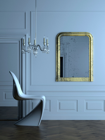Stylish, almost abstract, modern interior in a classical Parisian apartment in Haussman style.