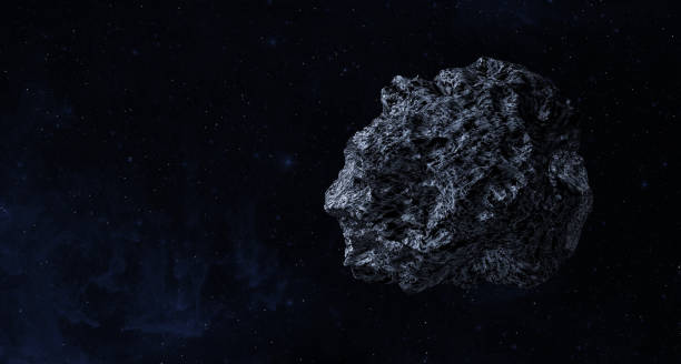 istock Asteroid or a meteorite flies in space. 1447989404