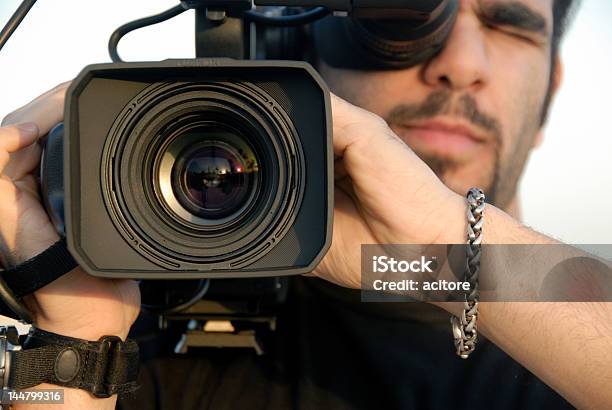 Filming With A Professional Camera Stock Photo - Download Image Now - Reality TV, Broadcasting, Camera Operator
