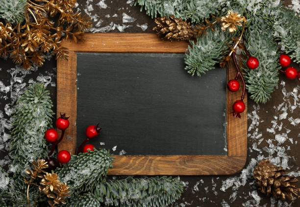 istock Vintage black chalkboard with Christmas decoration 1447995455
